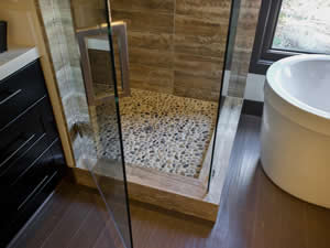 Shower with pebbled flooring 