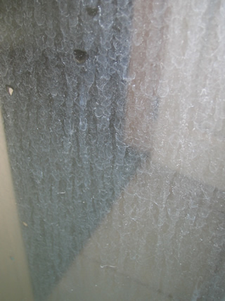 shower glass hard water stain